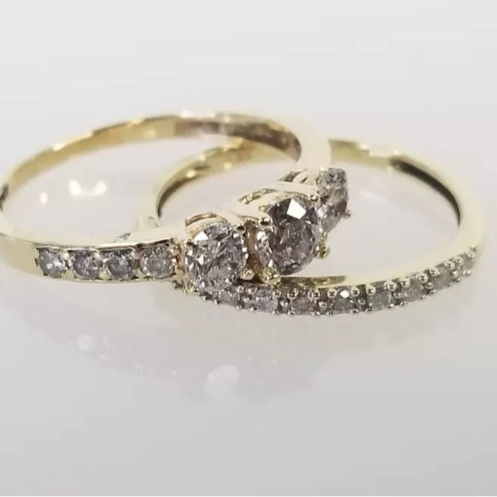 Yellow 10k Gold wedding ring set.